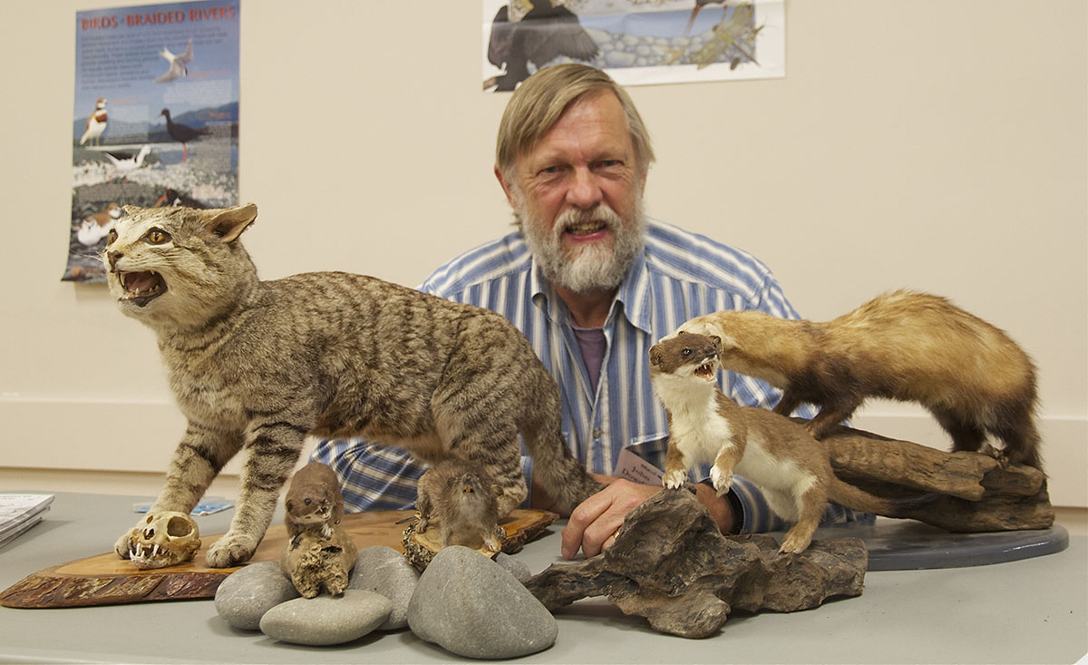 John Dowding with our collection of stuffed predators that we loan for educational purposes.